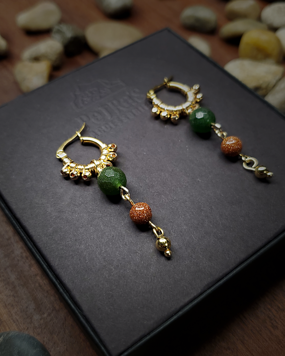 Gold small stainless steel hoop earrings hand wired with gold beads and dangling accent green venturine and sparkling sandstone beads. 